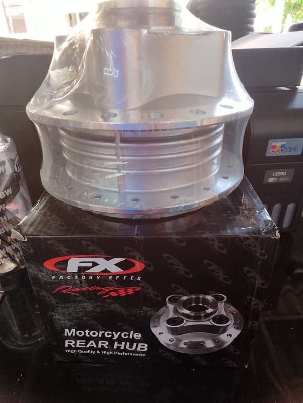 REAR HUB TMX125